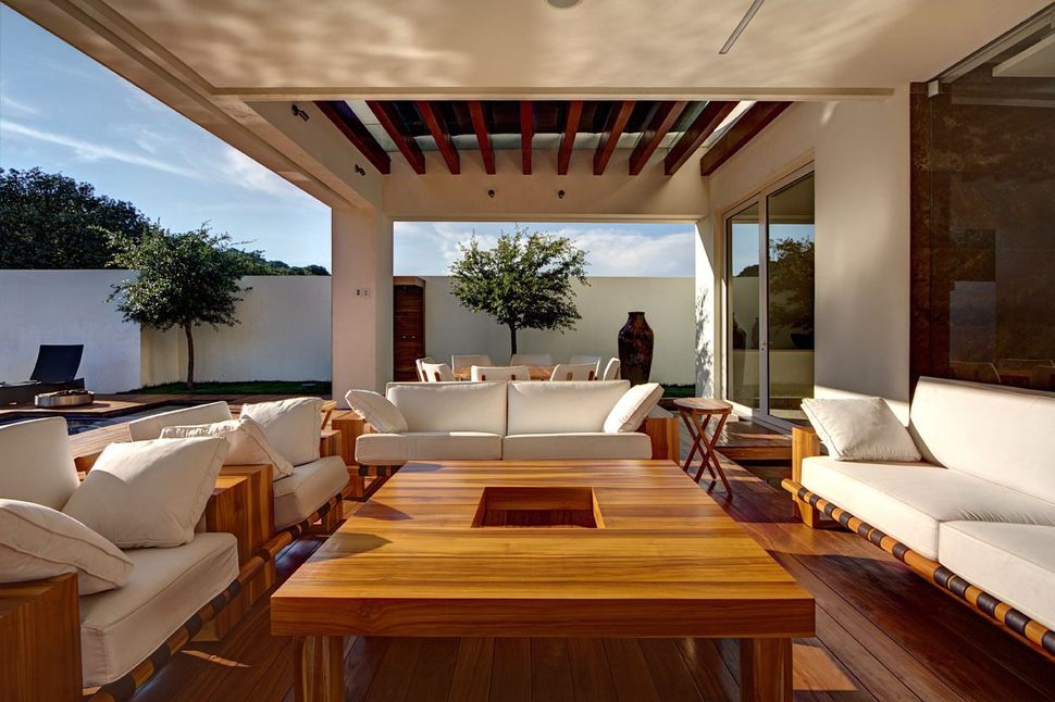 diverse-luxury-touches-within-complex-open-house-design-6-outdoor-sitting-area.jpg