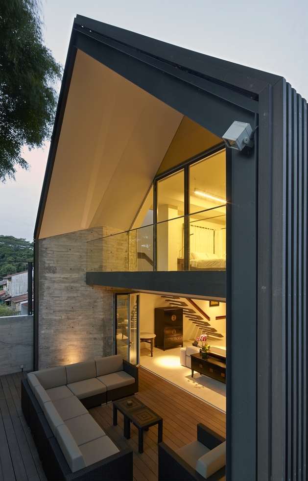 gabled-roof-jazzes-up-minimalist-y-house-singapore-24-backyard.jpg