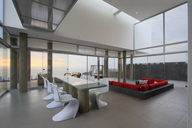 geometric-beach-house-with -floating-glazed-upper-floor-11.jpg