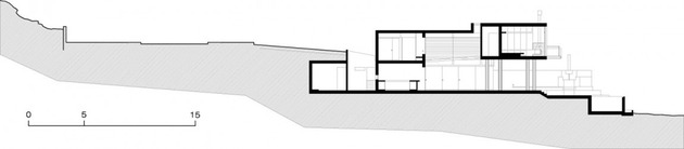 geometric-beach-house-with -floating-glazed-upper-floor-21.jpg