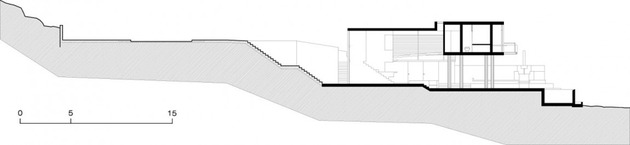 geometric-beach-house-with -floating-glazed-upper-floor-22.jpg
