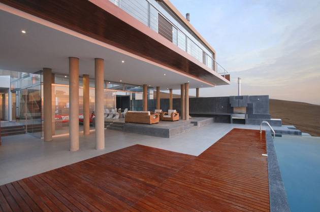 geometric-beach-house-with -floating-glazed-upper-floor-4.jpg