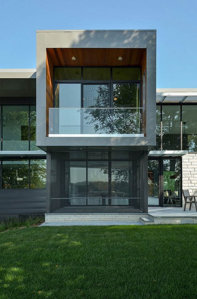 glass-lake-house-features-modern-silhouette-of-earthy-materials-28.jpg