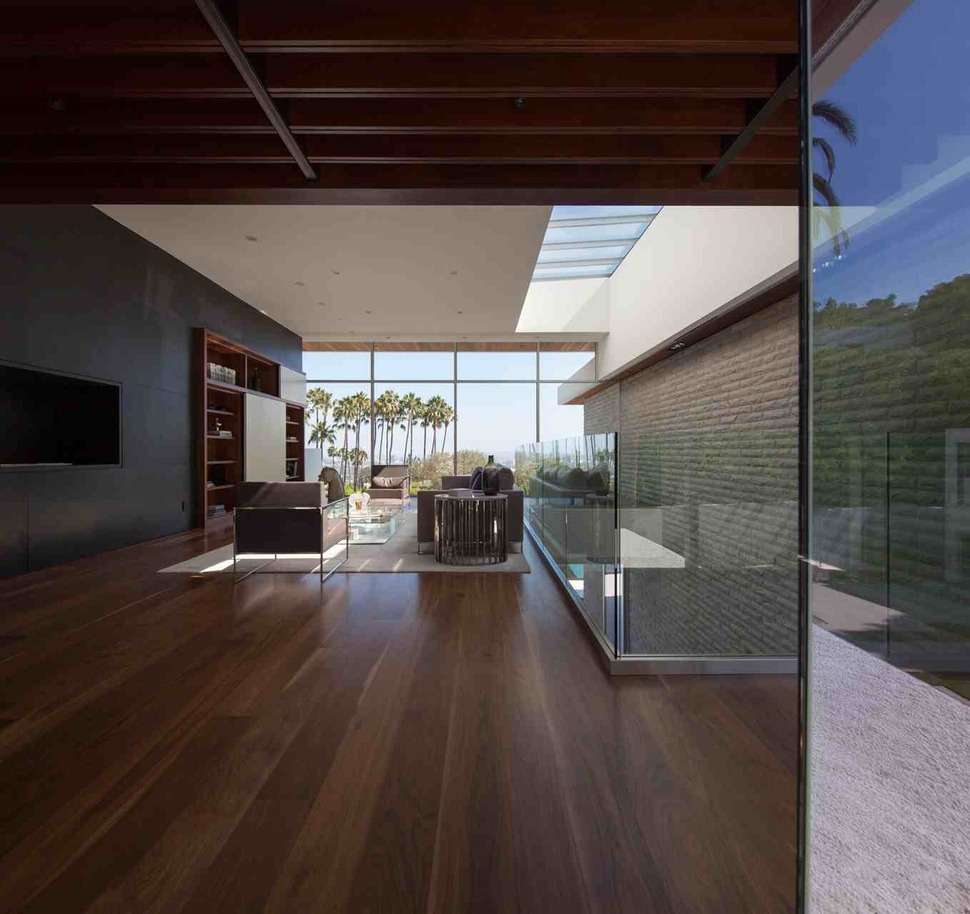 massive-ultramodern-hillside-los-angeles-jet-set-estate-18-living-room-far.jpg