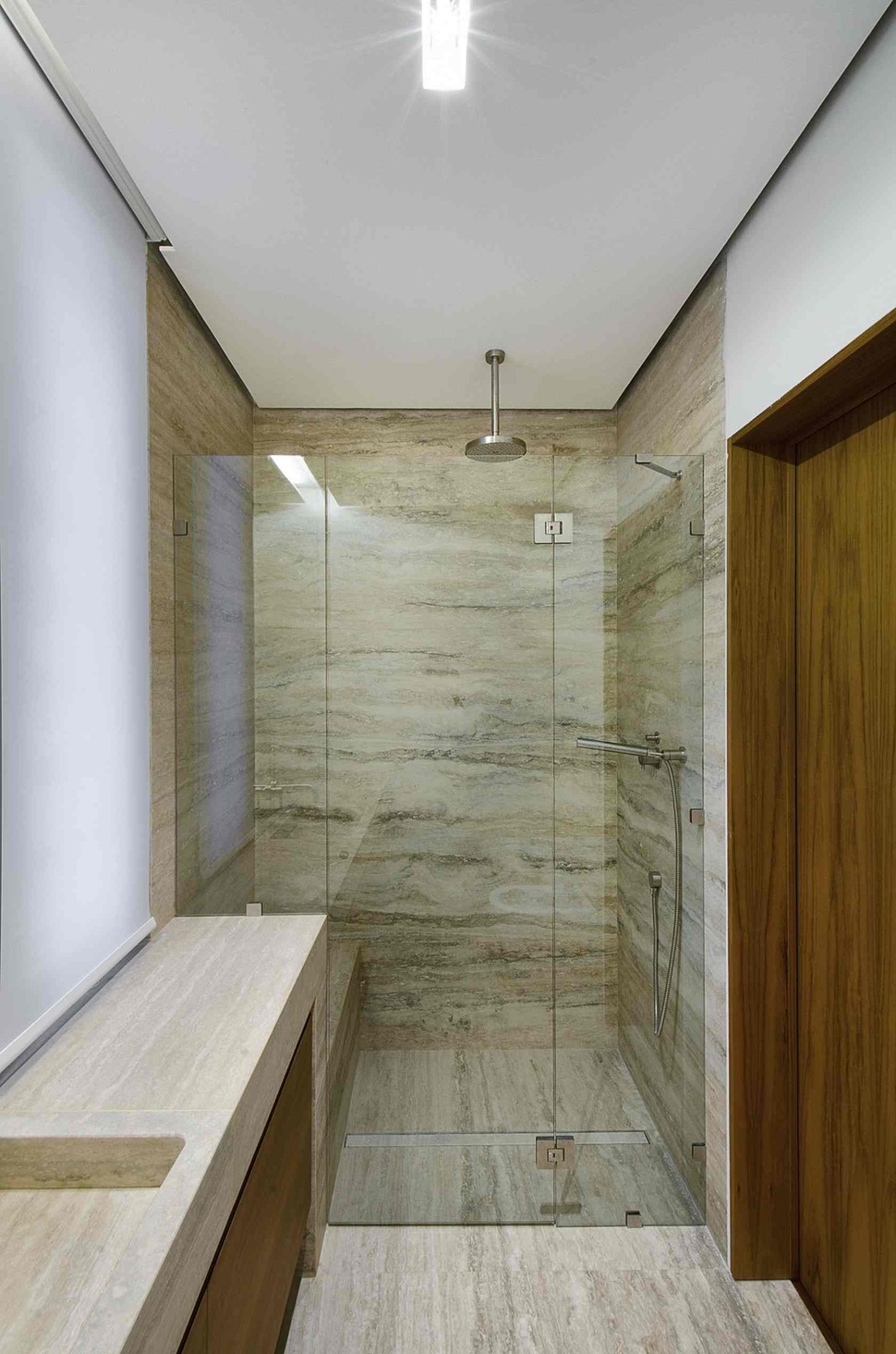 minimal-italian-home-blends-unique-stone-wood-finishes-22-shower.jpg