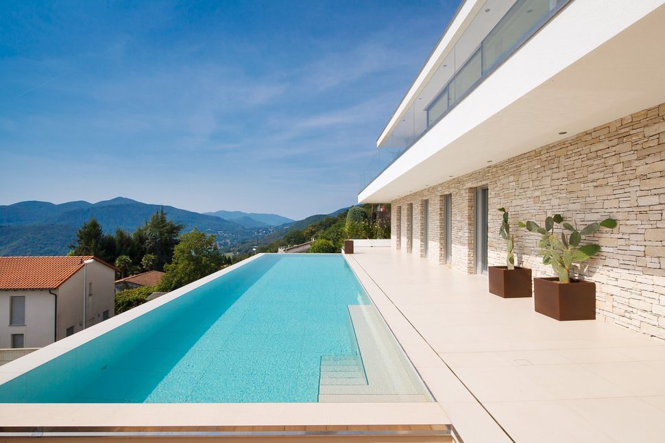 minimalist-mountain-top-home-panoramic-lake-views-2-pool.jpg
