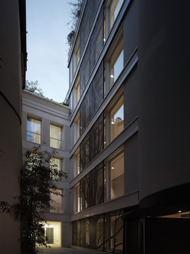 white-shades-define-luxurious-multistory-milan-apartment-19-exterior.jpg