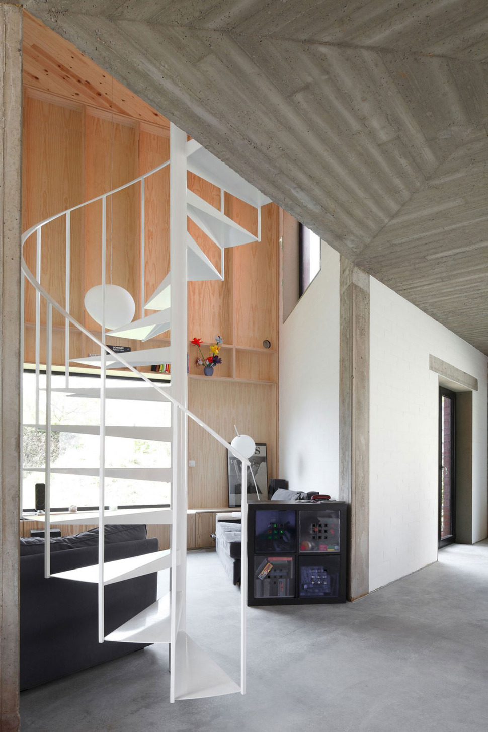 belgium-angle-house-with-concrete-wood-and-brick-interiors-7.jpg