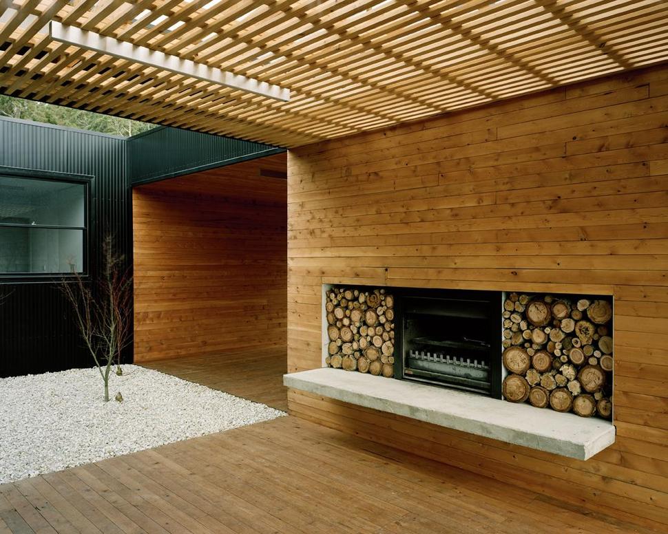 courtyard-house-built-for-severe-tasmanian-weather-9-fireplace-angle.jpg