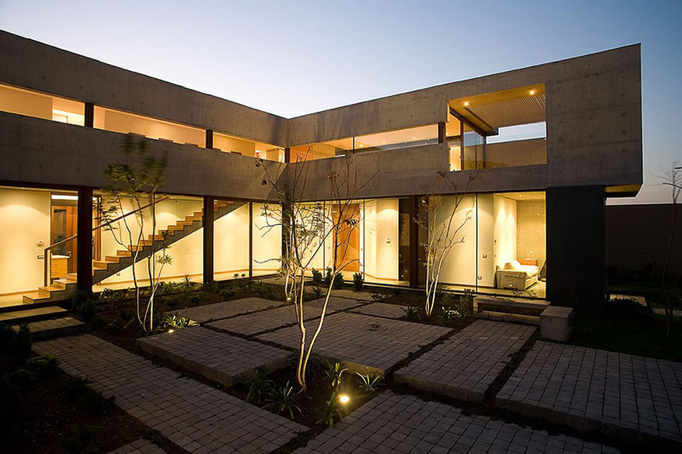 courtyard-house-with-glass-lower-floor-and-concrete-upper-12.jpg