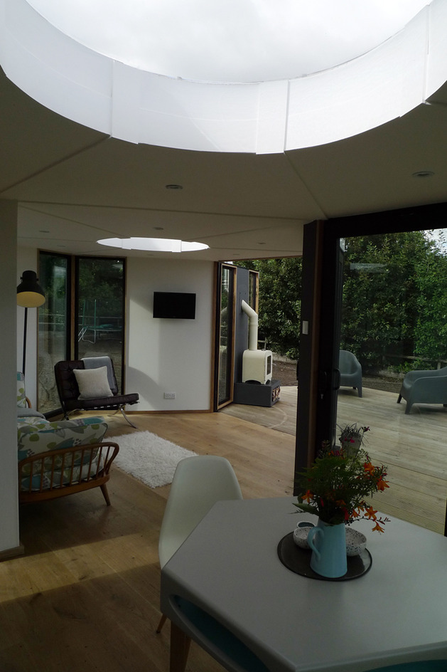 flat-pack-hivehaus-transforms-hexagonal-modular-homes-10-dining.jpg