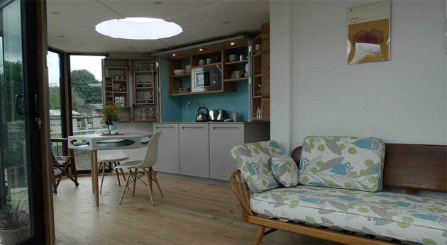 flat-pack-hivehaus-transforms-hexagonal-modular-homes-9-kitchen.jpg