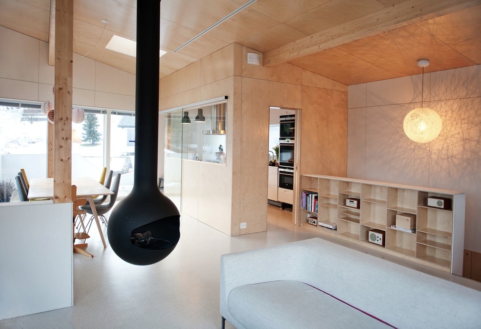 geometric-norwegian-house-with-creative-interior-fixtures-13-fireplace.jpg