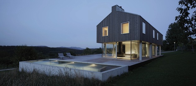 isolated swiss countryside home glass encased lower floor 2 night pool thumb 630x276 23976 Isolated Swiss Countryside Home With Glass Encased Lower Floor