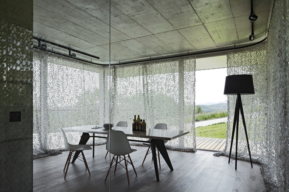 isolated-swiss-countryside-home-glass-encased-lower-floor-6-table.jpg