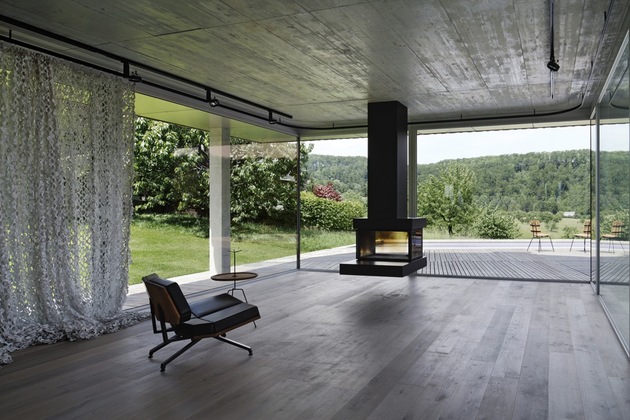 isolated-swiss-countryside-home-glass-encased-lower-floor-8-living-room.jpg