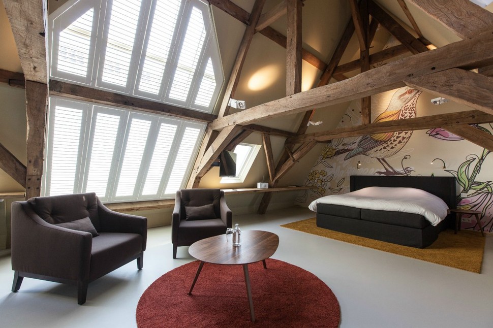 modern-rustic-inspiration-belgium-features-exposed-ceilings-1-bird-headboard.jpg