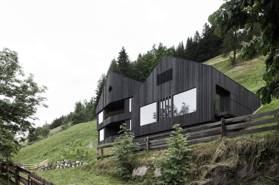 mountain-vacation-villa-italy-built-local-dolomite-wood-17-1-facade.jpg