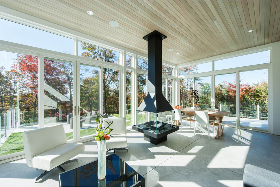 quebec-home-embraces-nature-with-glazing-and-open-interior-12.jpg