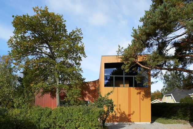 sweeping swedish family home with colors inspired book 1 trees facade thumb 630x420 23725 Sweeping Swedish Family Home With Colors Inspired By Book