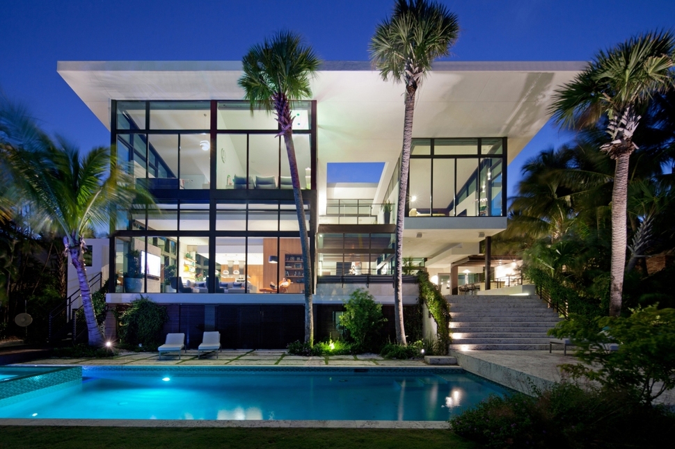 traditional-street-facade-hides-modernist-home-miami-lake-1-back-view.jpg