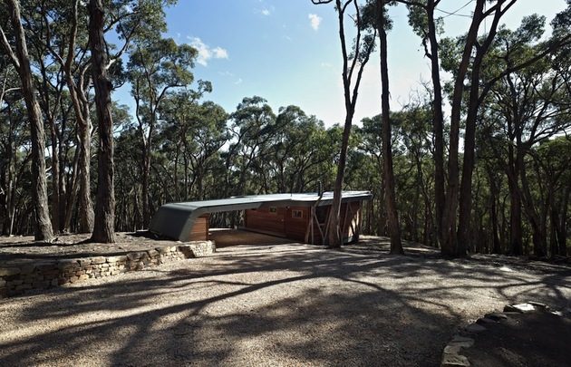 ultramodern-reinvention-traditional-woodland-cabin-with-timber-structure-6-driveway.jpg