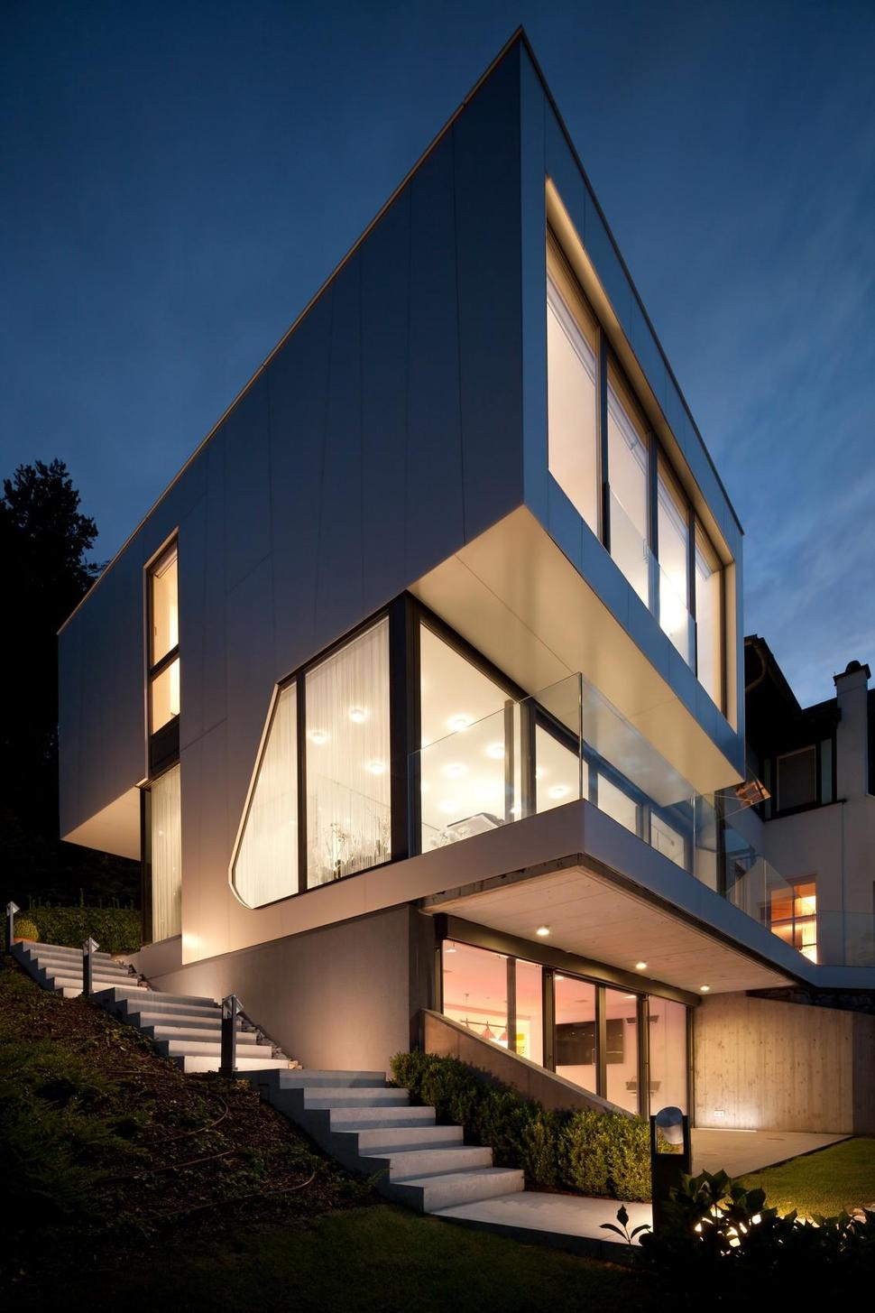 3-storey-home-addition-takes-advantage-dockside-views-16- facade night.jpg