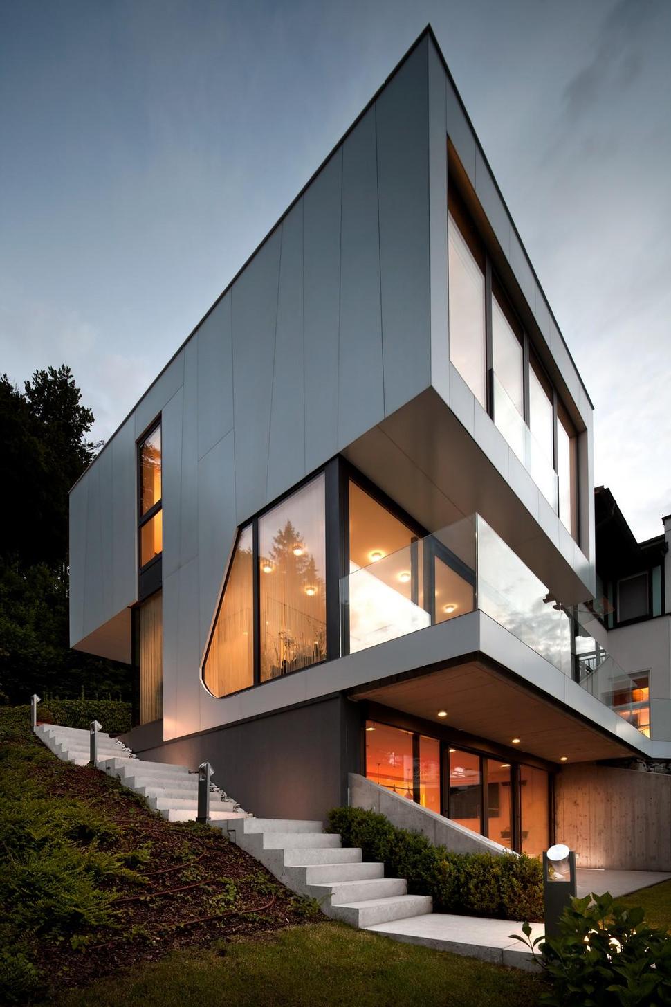 3-storey-home-addition-takes-advantage-dockside-views-7-side-facade.jpg