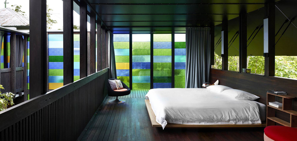 coloured-glass-walls-sparkle-from-cottage-addition-8-masterbedroom.jpg