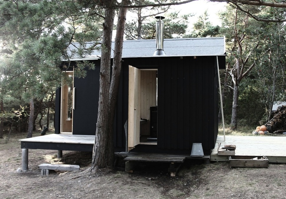 compact-plywood-pine-cabin-with-attached-sauna-5-sauna-door.jpg