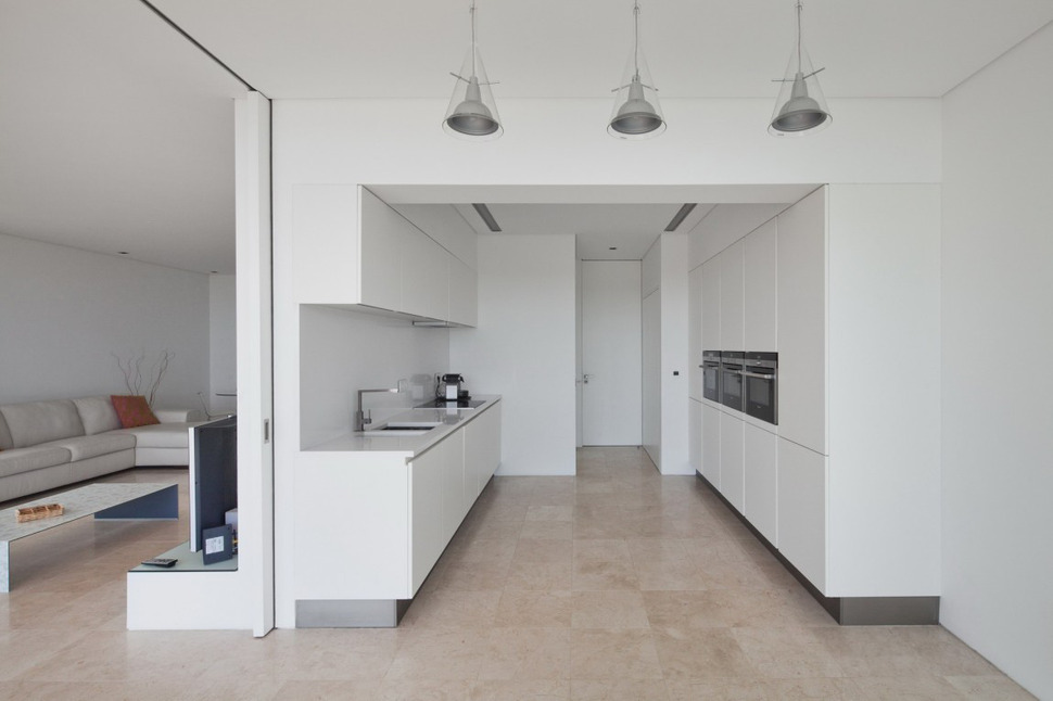 minimalist-white-house-with-glass-walkway-in-olive-grove-15.jpg