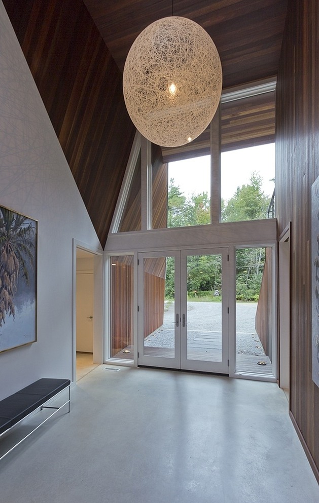 modern-massachusetts-woodland-house-with-two-story-ceilings-4-inside-entry.jpg