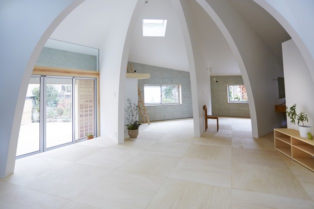 open-concept-japanese-family-home-with-domed-interior-6-back-door-angle.jpg