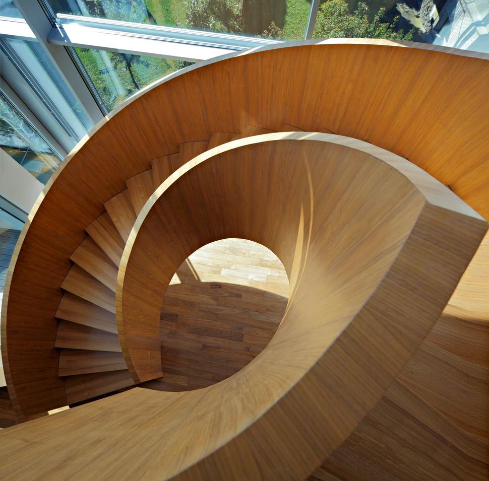 sculptural-circular-stairwell-focus-minimalist-residence-11-stairs-above.jpg