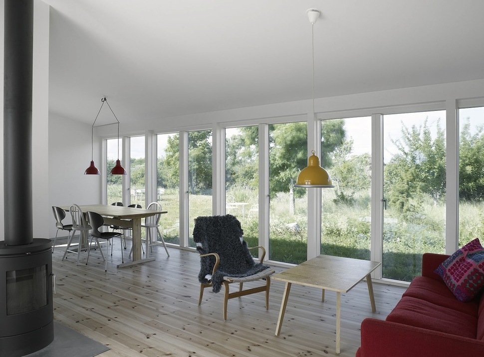 small-swedish-house-made-from-boards-corrugated-metal-9-main-room.jpg