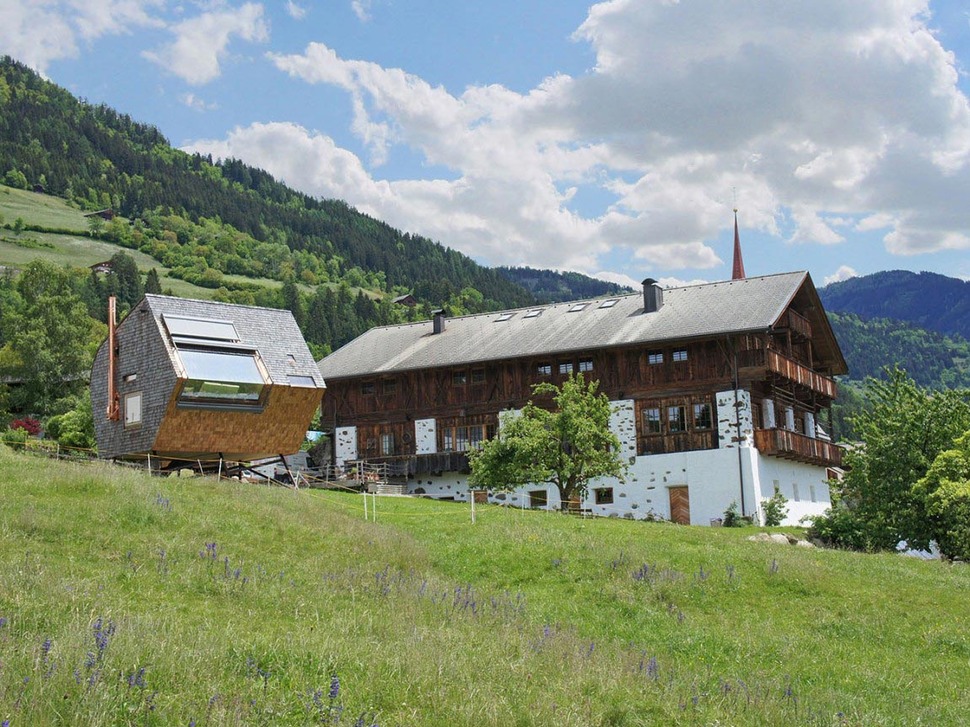 wood-shingled-austrian-mountain-house-with-sloped-walls-23.jpg