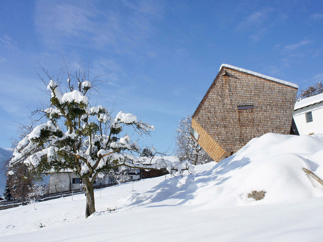 wood-shingled-austrian-mountain-house-with-sloped-walls-3.jpg