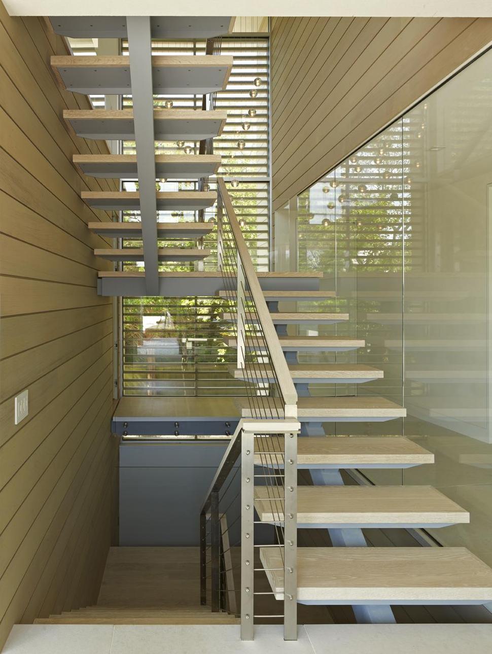 energy-star-residence-flanked-pool-pond-5-stairwell.jpg