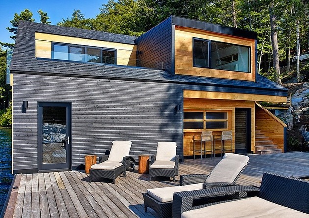 floating-wooden-one-bedroom-cabin-with-integrated-boathouse-4-decks-windows.jpg