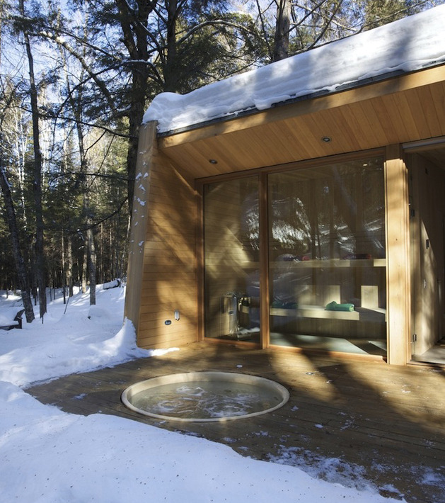 forest-getaway-cabin-dominated-by-warm-wood-boards-3-patio.jpg