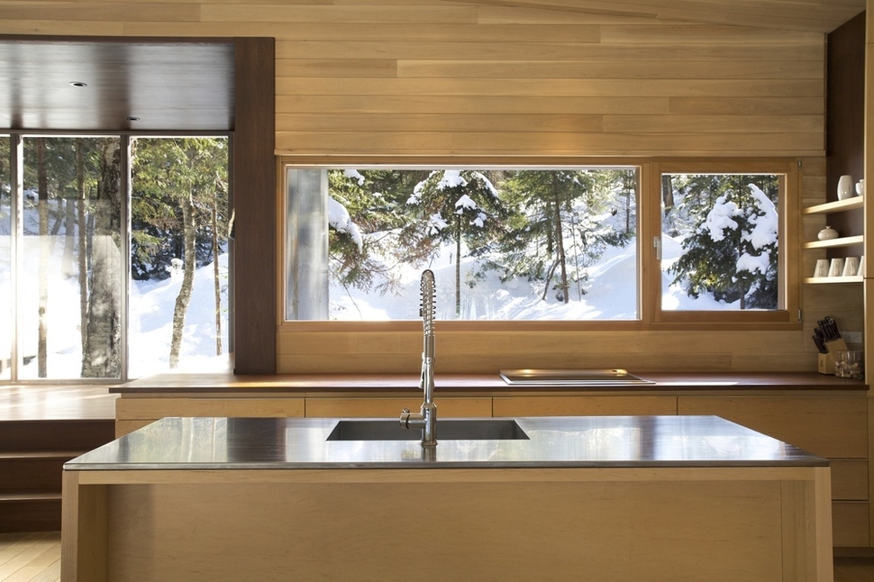 forest-getaway-cabin-dominated-by-warm-wood-boards-6-kitchen-straight.jpg