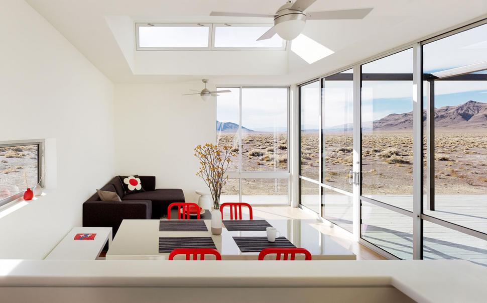 isolated-desert-getaway-house-with-retractable-deck-cover-6-living-room-kitchen.jpg