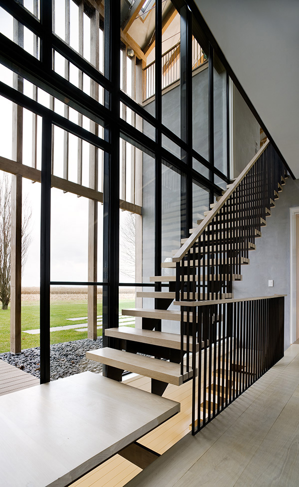 tall-farm-style-estate-home-with-slatted-wood-siding-8-stairs.jpg