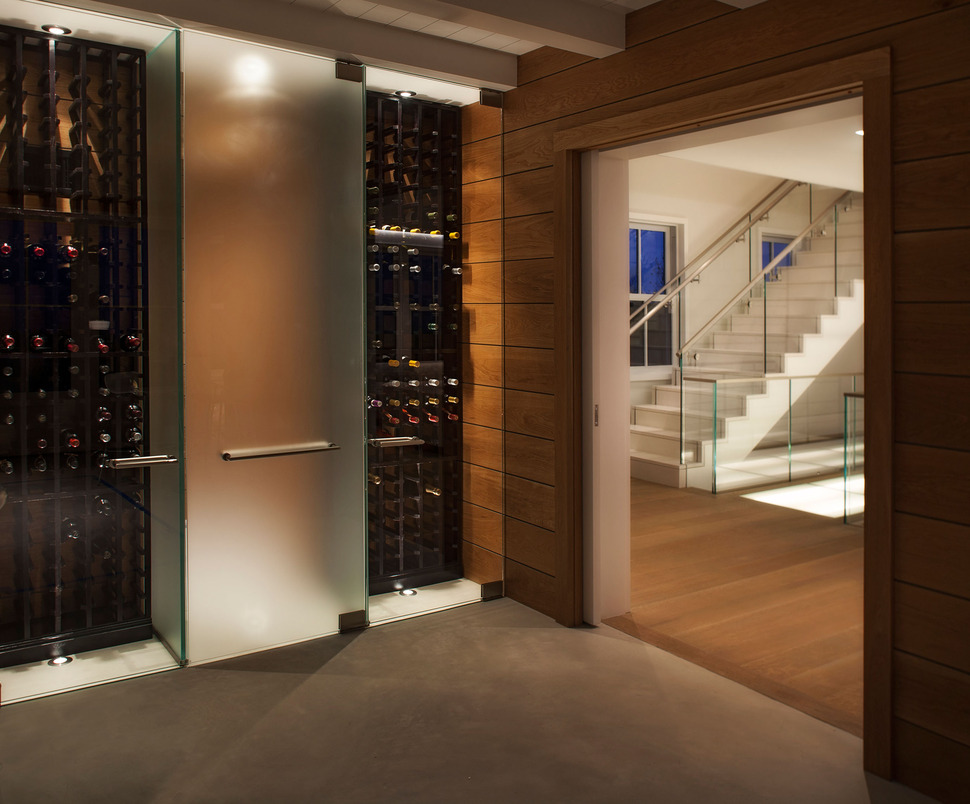 traditional-exterior-hides-colourfully-contemporary-interior-14-wine-cellar.jpg