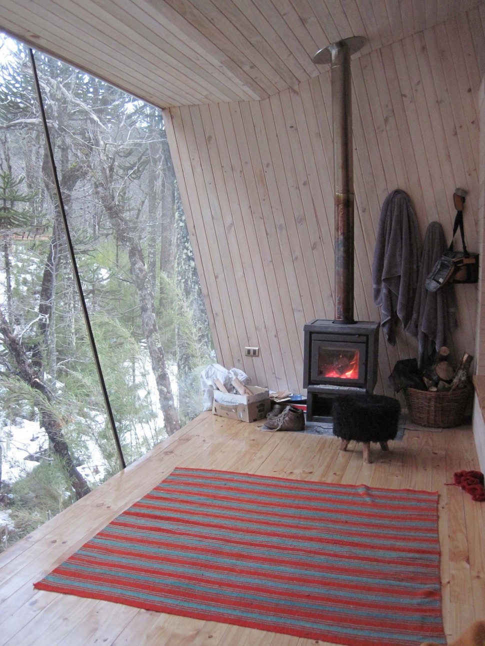 winter-cabin-accessed-elevated-walkway-9-fireplace.jpg