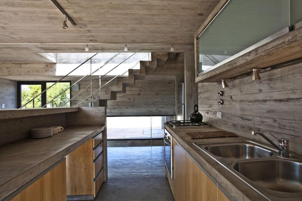 low-maintenance-concrete-beach-house-10-kitchen.jpg