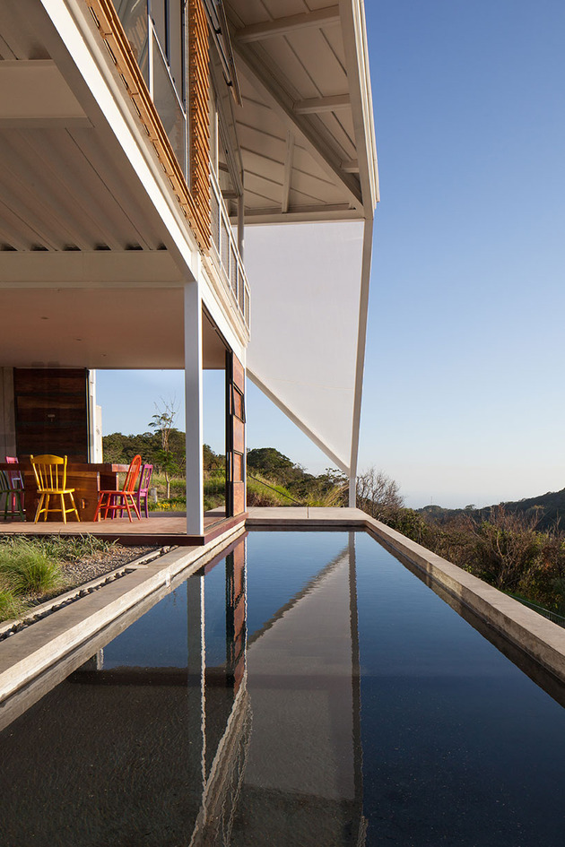 outdoor-living-house-under-geometric-canopy-10-pool-close.jpg