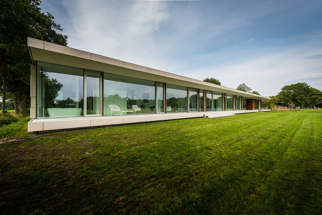 concrete-home-walls-glass-private-pasture-16-bathtub-exterior.jpg