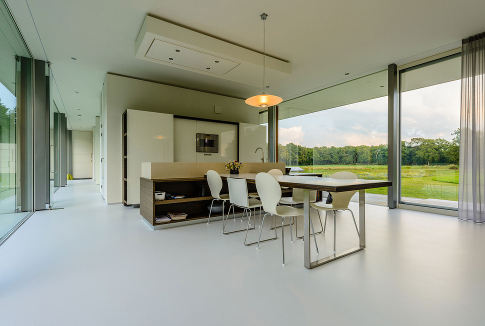 concrete-home-walls-glass-private-pasture-8-dining.jpg