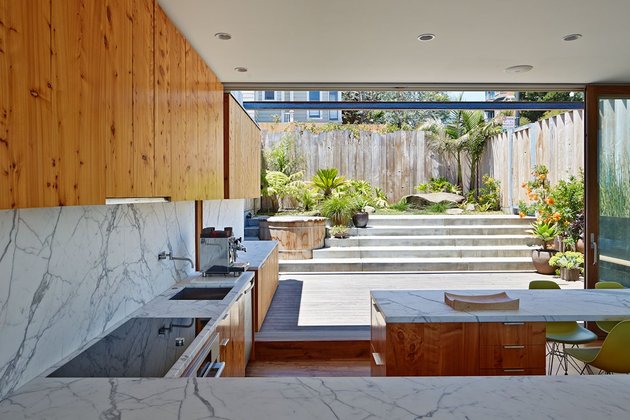 garage-upper-deck-connects-glass-home-slope-11-kitchen.jpg